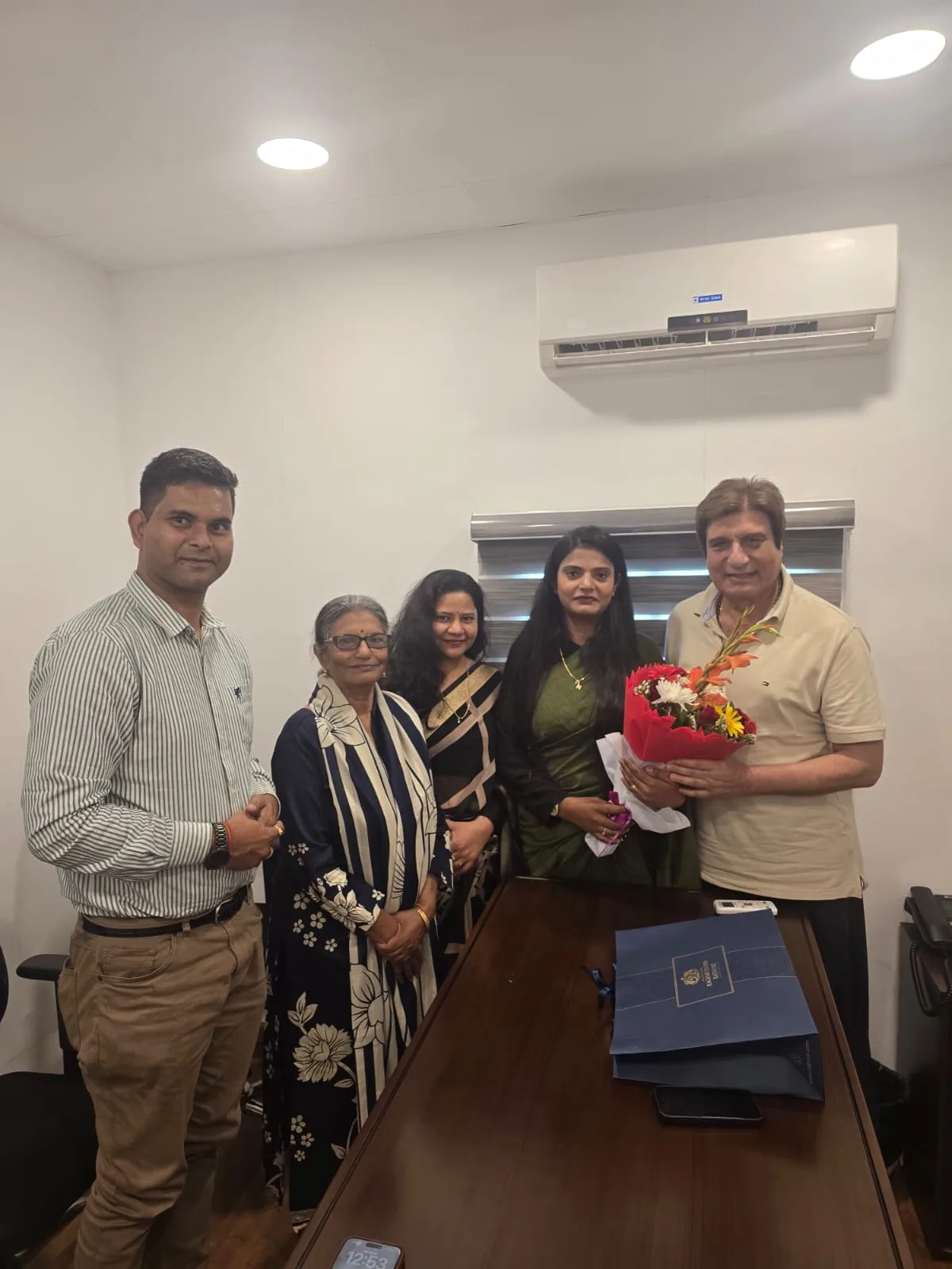 Dr. Nidhi Kant with a group during a professional meeting